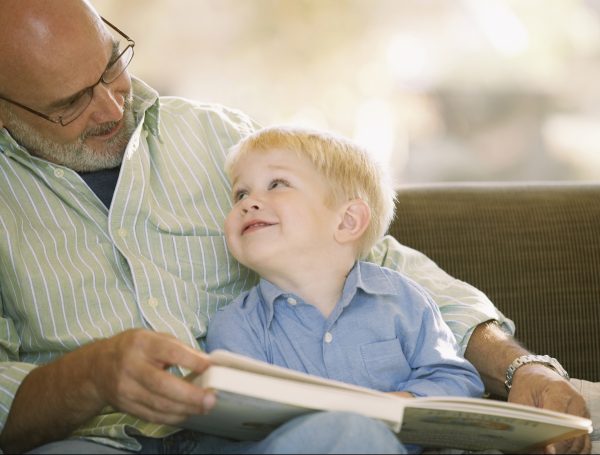 Ledingham McAllister Real Estate Developers, Apartments For Sale, Ledmac Homes, New Condos, Vancouver, Burnaby - Grandfather reading with his grandson